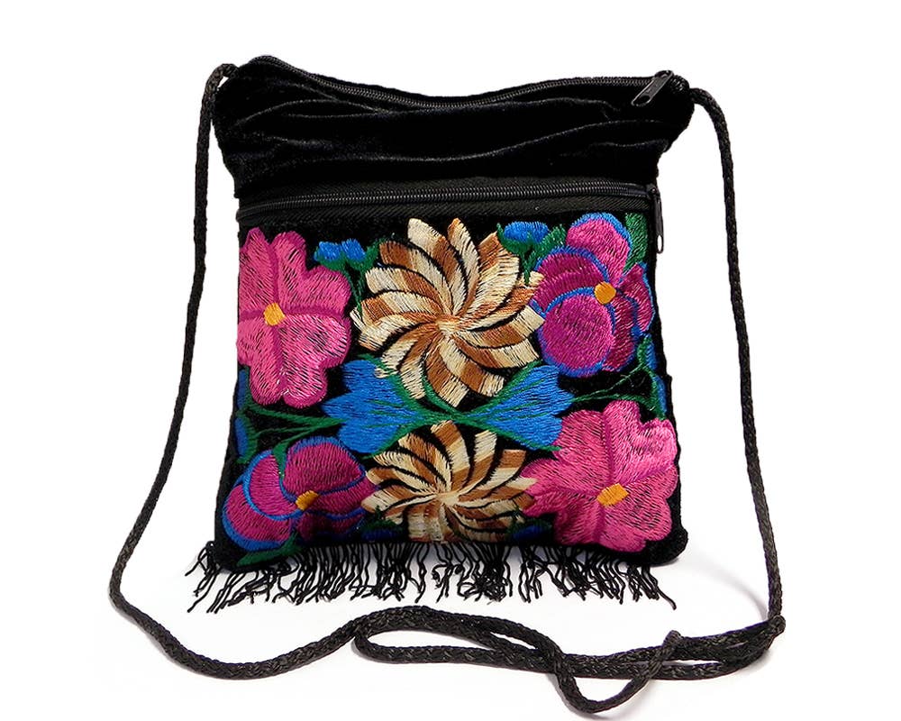 Black drawstring bag with colorful floral embroidery on a white background
