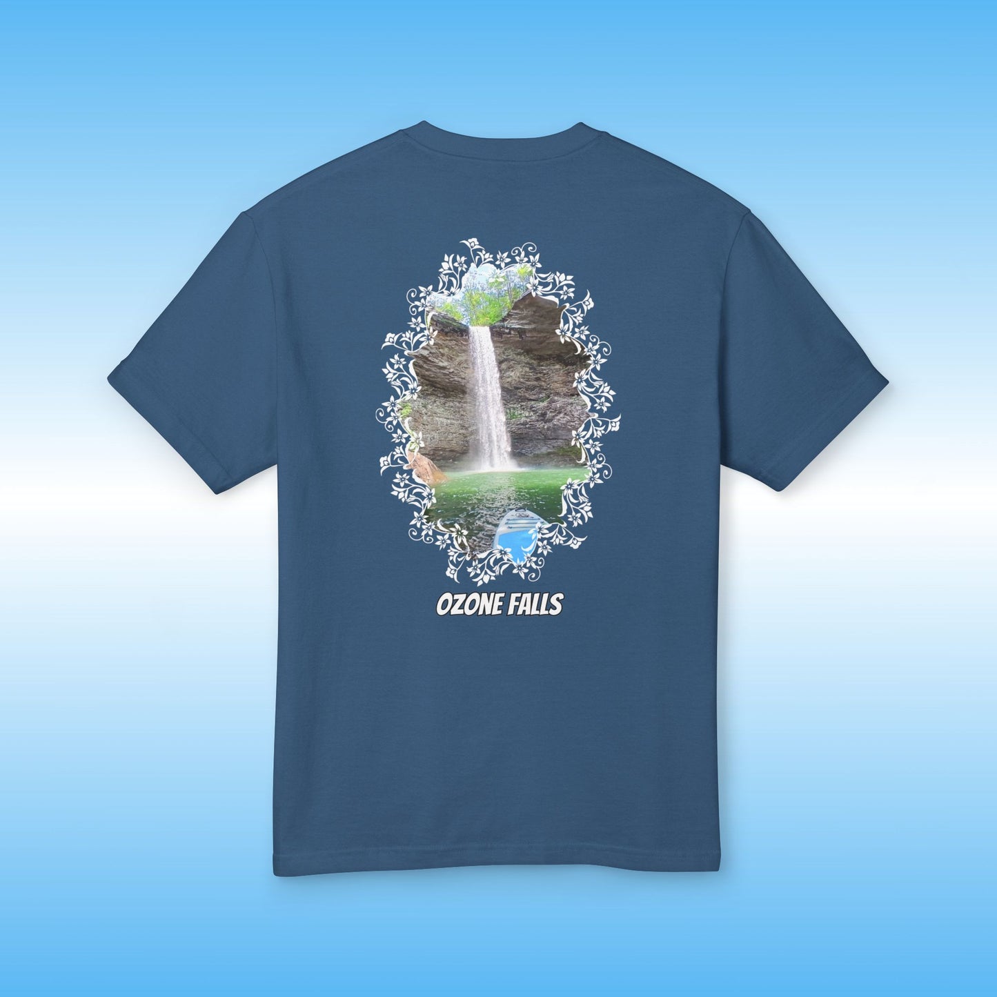 Navy blue t-shirt with a graphic of Ozone Falls on a light blue background | Paddle Frogs