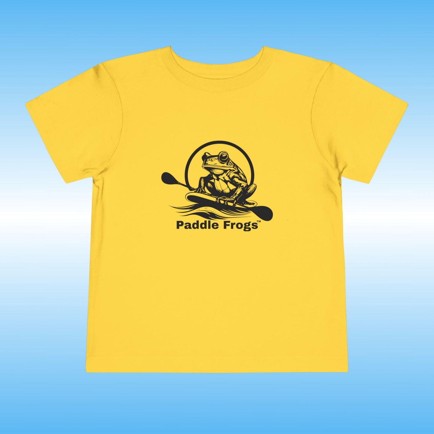 Yellow t-shirt with 'Paddle Frogs' logo on a blue background