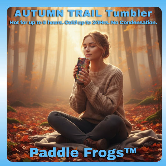 Woman in a forest holding a Paddle Frogs Autumn Trail tumbler with promotional text about its temperature retention capabilities.