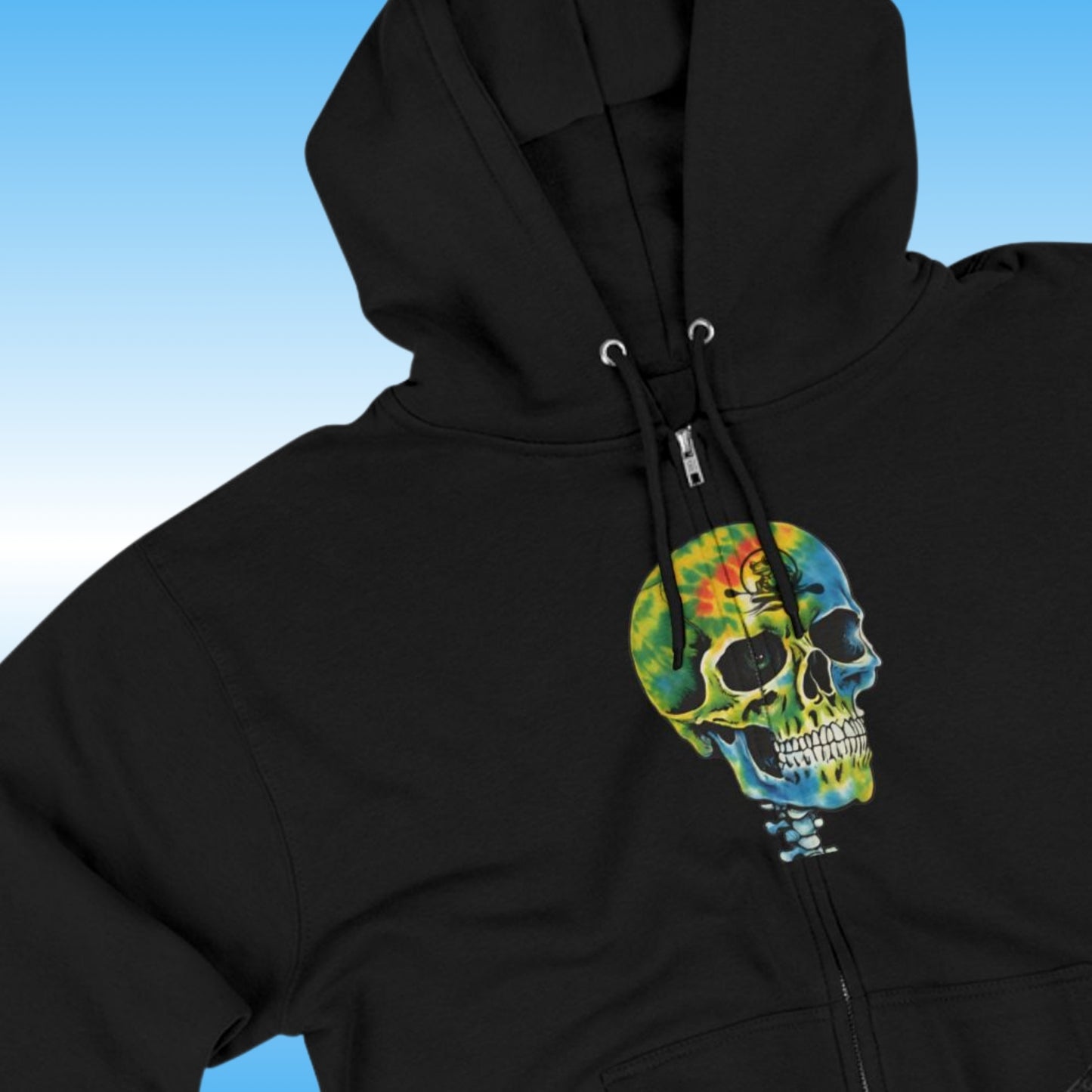 Balanced Bennie | Tie Dye | Full Zip-Up | Hoodie | Skeleton | Close up for details photography | Black hoodie with a colorful skull design on a blue gradient background