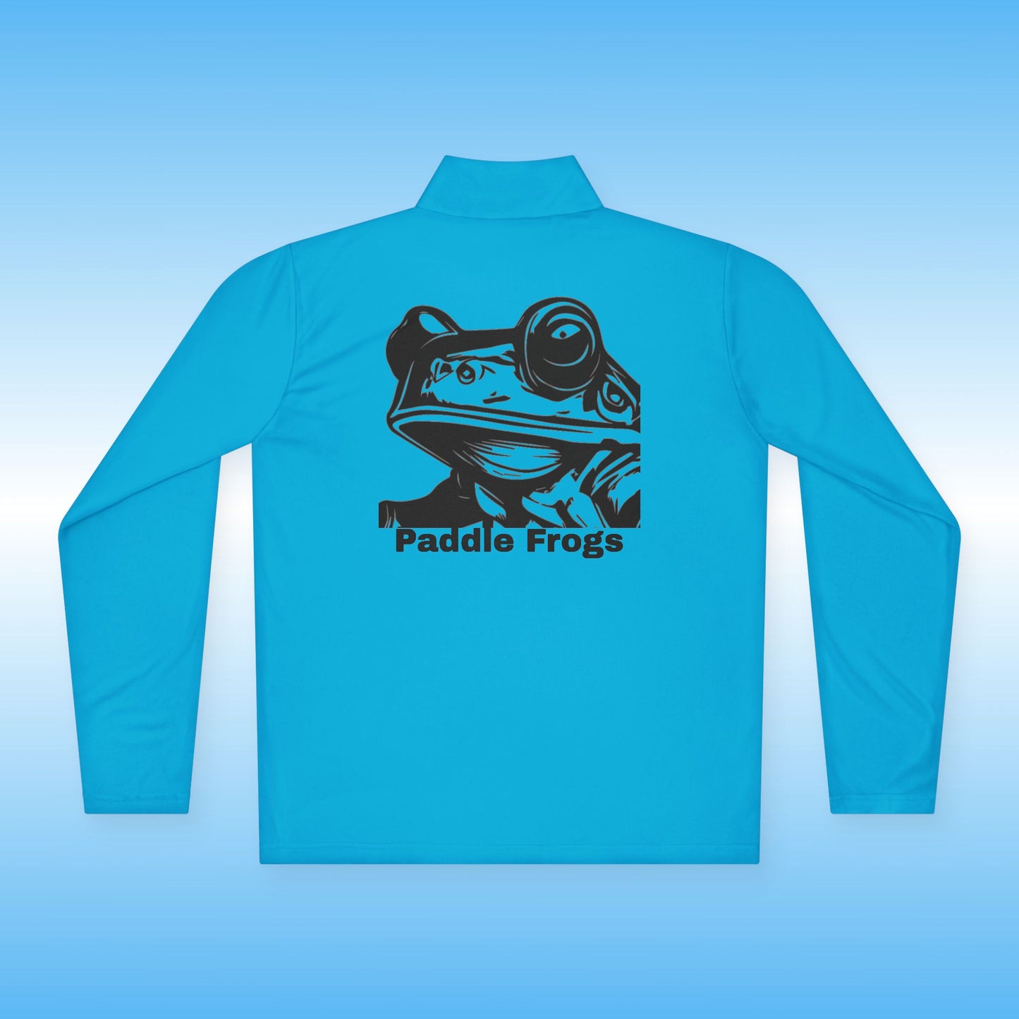 Blue long-sleeve shirt with a frog graphic and 'Paddle Frogs' text on a light blue background