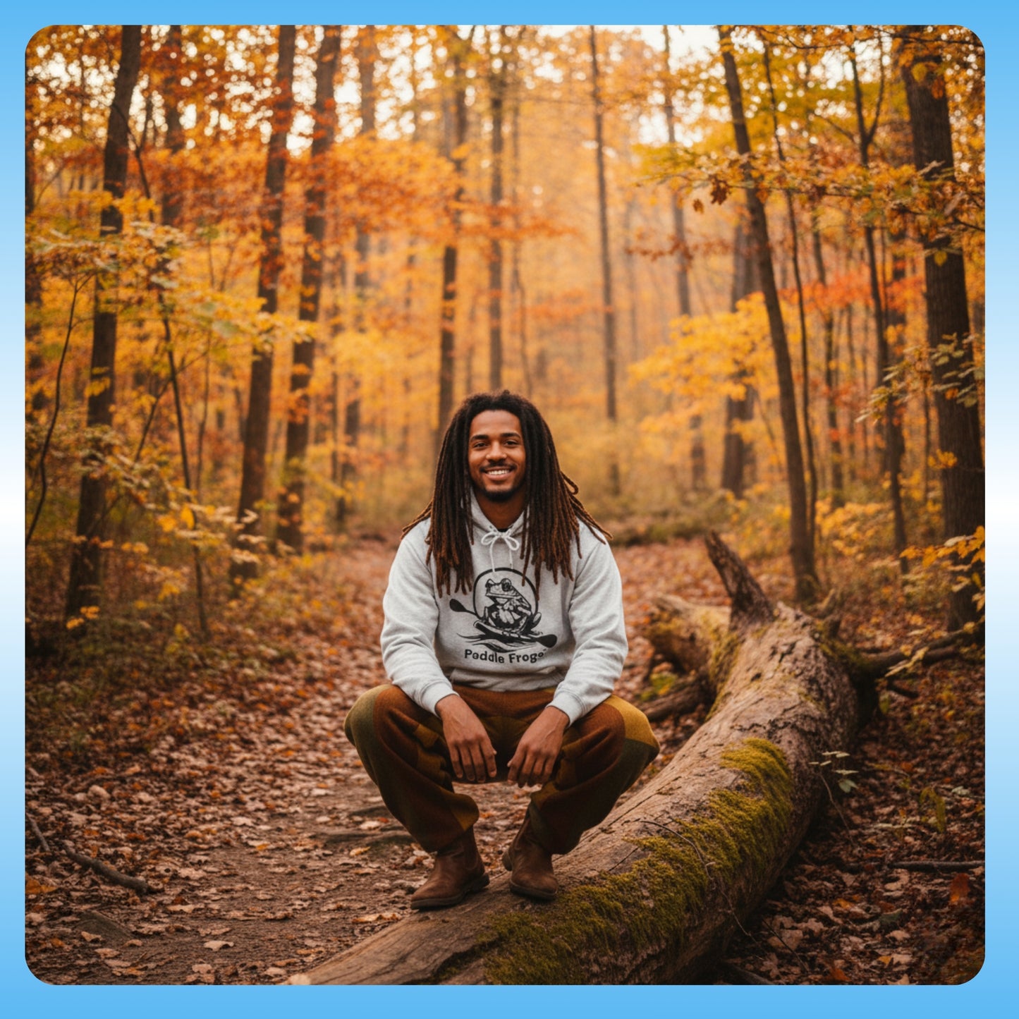 Extra Cozy & warm white Paddle Frogs Outdoor Gear Hoodie pull over coat grey Man sitting on a log in a forest with autumn foliage