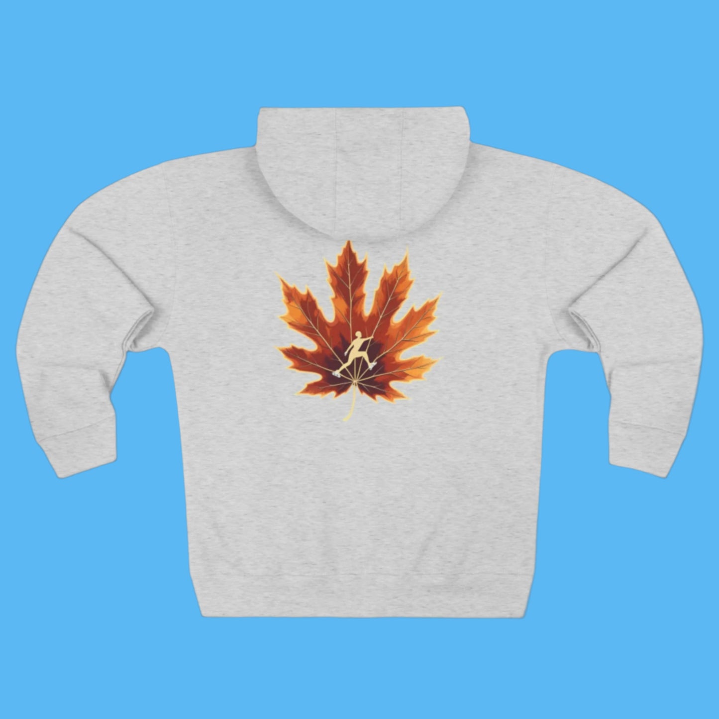 Gray Ice Skater hoodie with a leaf Grey hoodie with a maple leaf and forest design Autumn Trail hoodie with Zipper and Pockets. Cozy hood and a maple leaf with an ice skater and fall season forest design on a path to Autumn's Trail in the Paddle Frogs crew story.