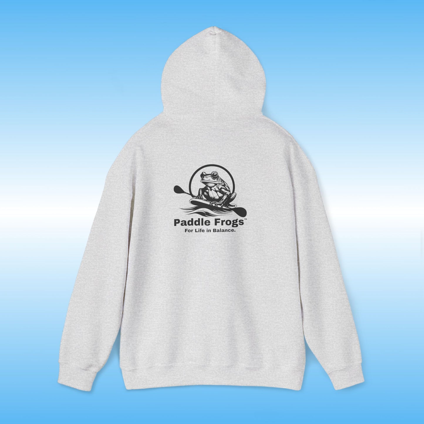 Heather Grey hoodie with 'Paddle Frogs' logo on a blue gradient background Heather Gray Original frog on a paddle board with a double bladed paddle For Life in Balance.