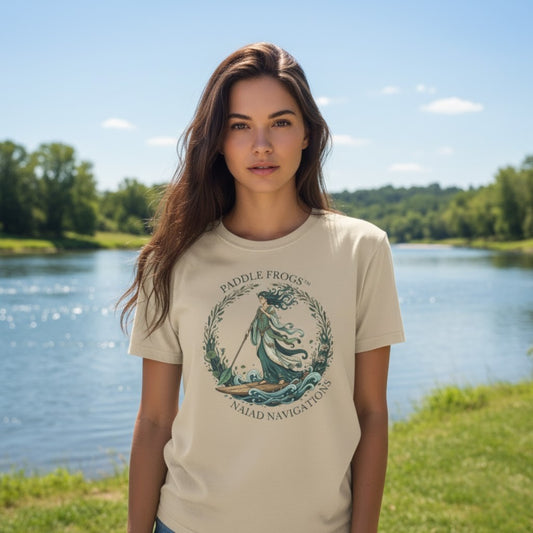NAIAD NAVIGATIONS | Paddle Frogs: T-shirt | Sand tan color with our brunette model at the river
