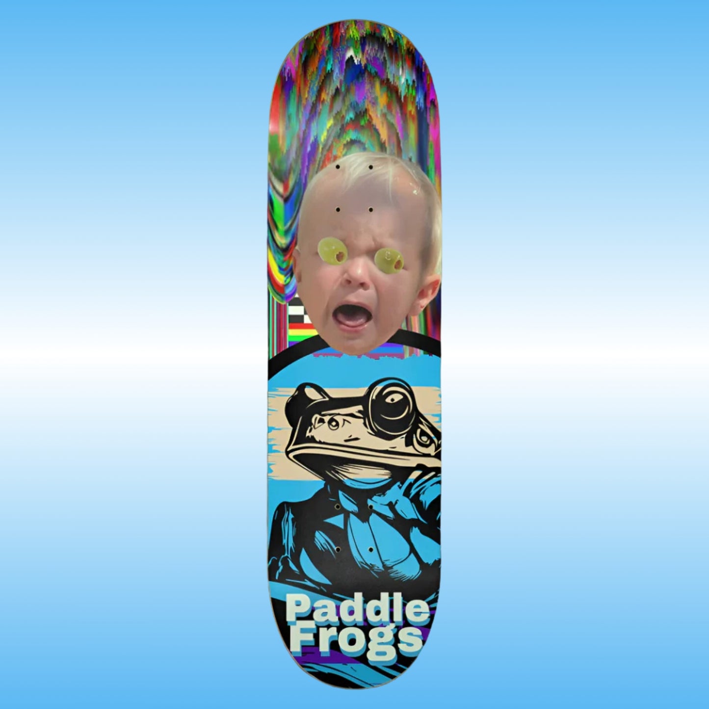 Olive Chaos - Paddle Frogs | Skateboard deck with colorful design and 'Paddle Frogs' branding on a blue background