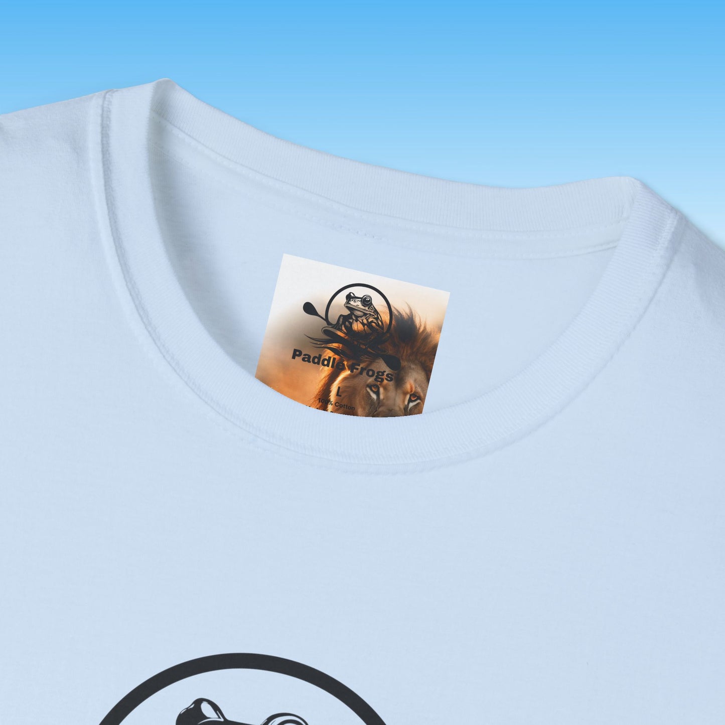 Paddle Frogs | Lion Edition | light blue t-shirt with a brand label featuring a logo and text on a blue background