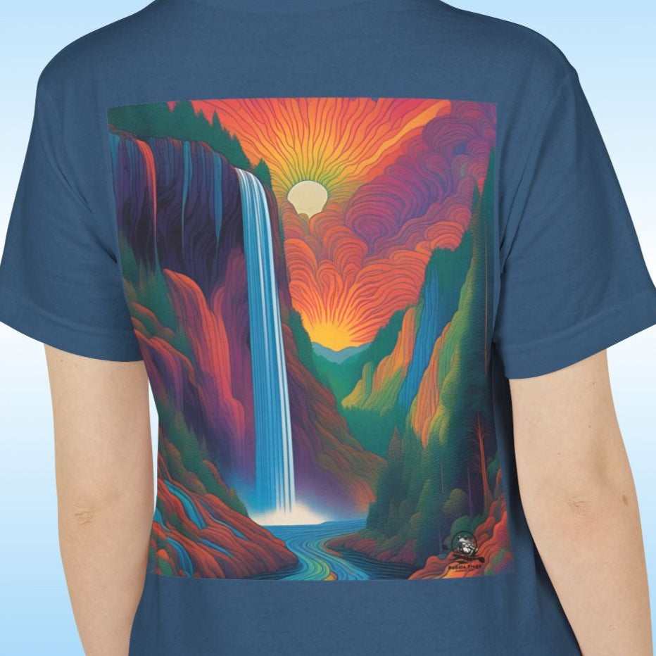 Person wearing a blue t-shirt with a colorful Pop Art mountain and waterfall design on the back against a light blue background
