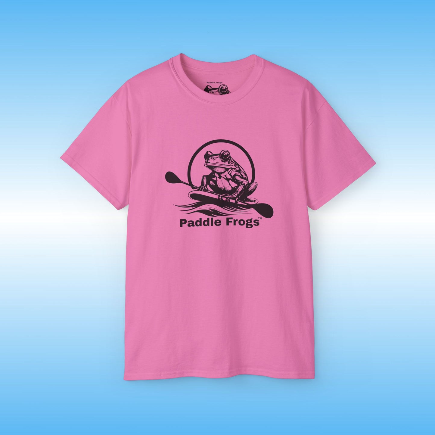 Pink t-shirt with 'Paddle Frogs' logo on a blue background