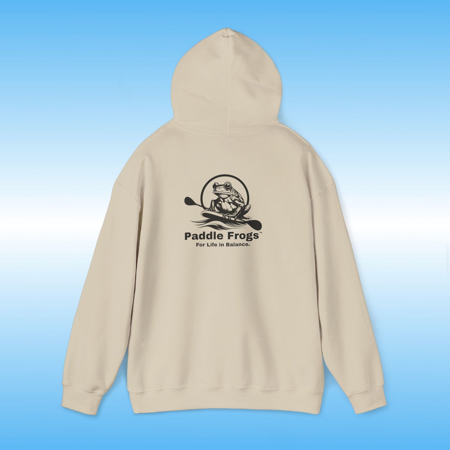 Sand Tan hoodie with 'Paddle Frogs' logo on a blue gradient background Heather Gray Original frog on a paddle board with a double bladed paddle For Life in Balance.
