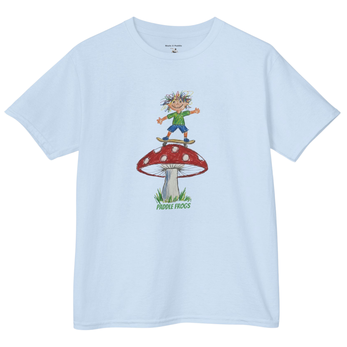Light blue t-shirt with a graphic of a child skateboarding on a mushroom and 'Paddle Frogs' text.