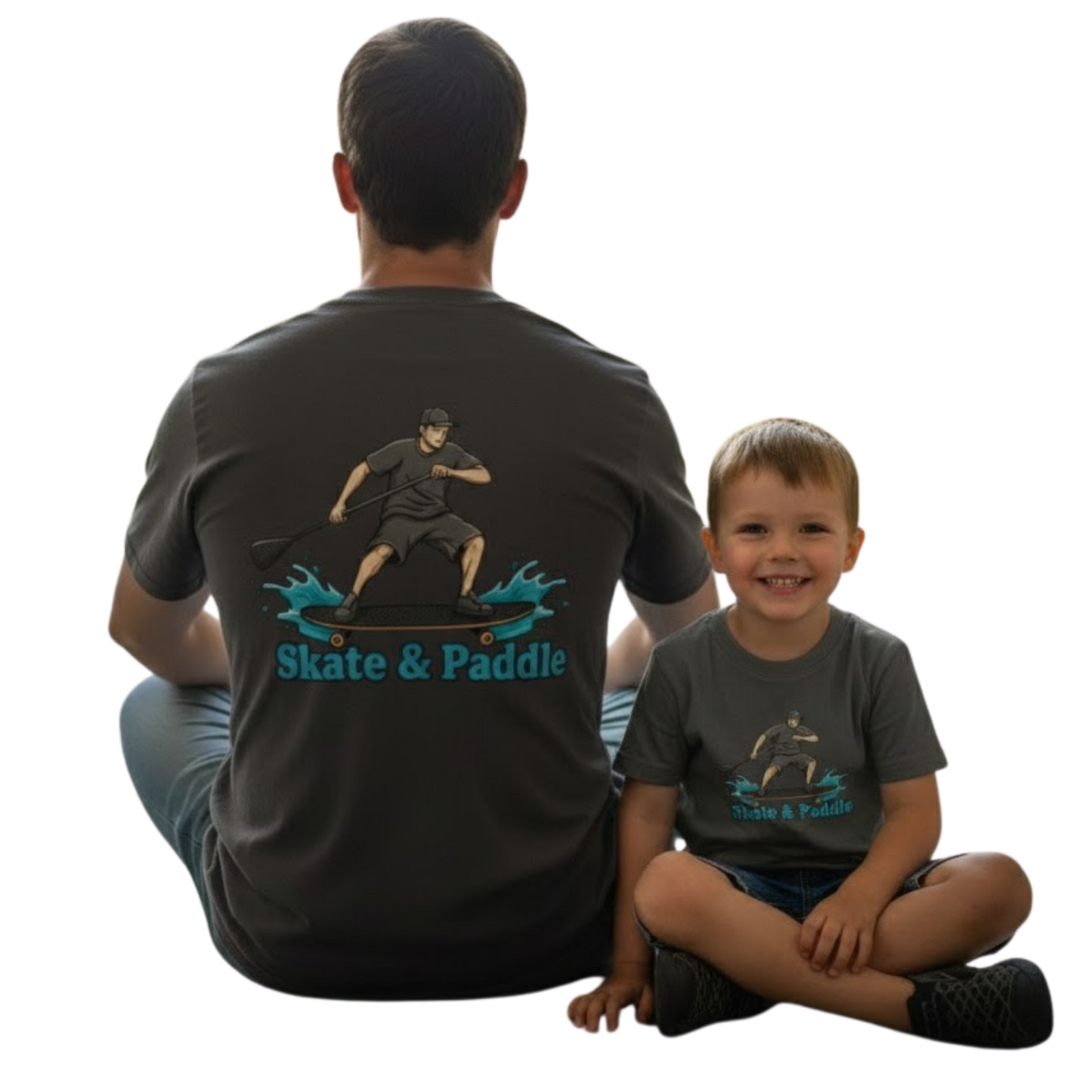 Man and child wearing matching 'Skate & Paddle' t-shirts by Paddle Frogs on a transparent background