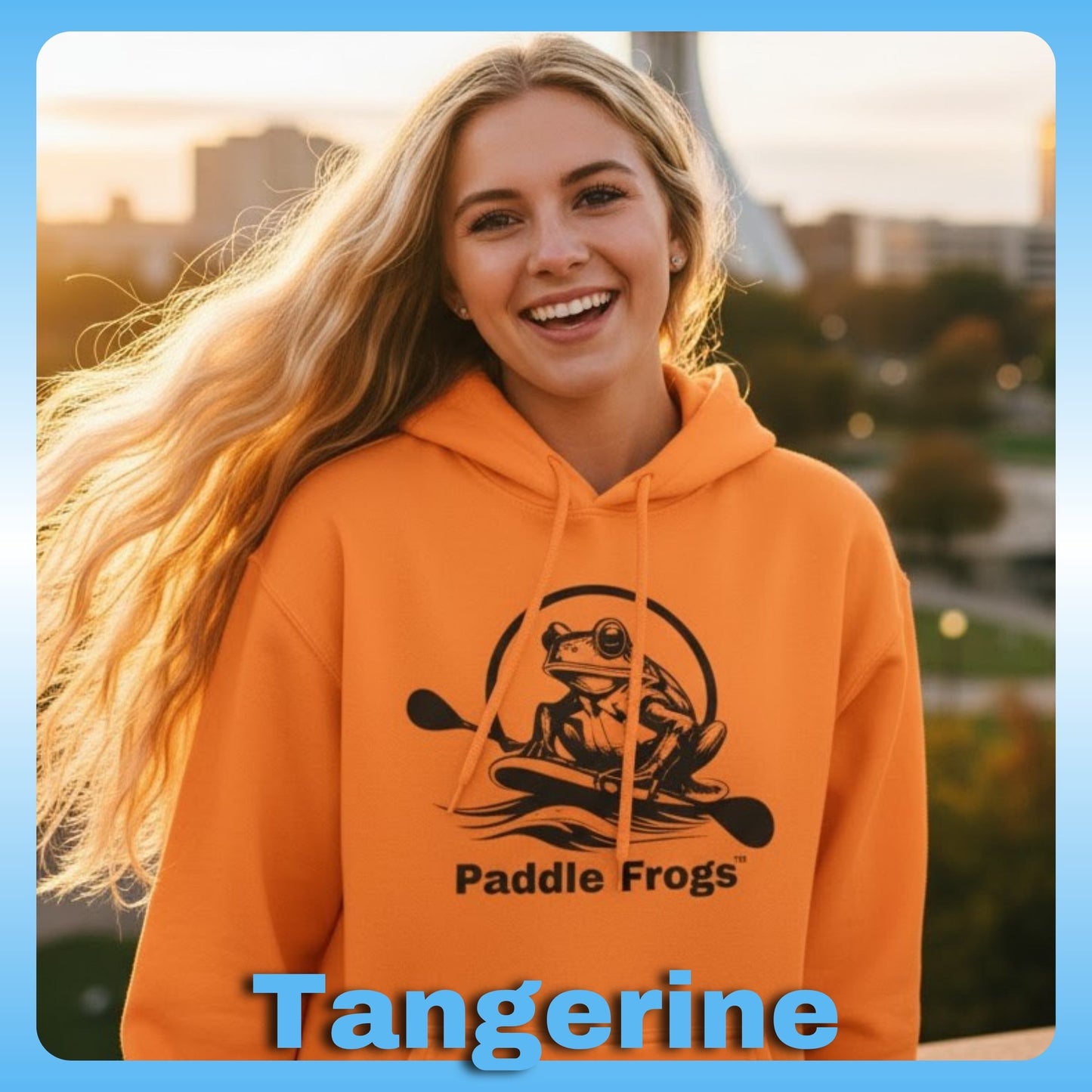 Young lady smiling wearing Tangerine orange | Paddle Frogs™ Soft Fleece Hoodie: Soft Fleece, Wild Soul (12 Colors)
