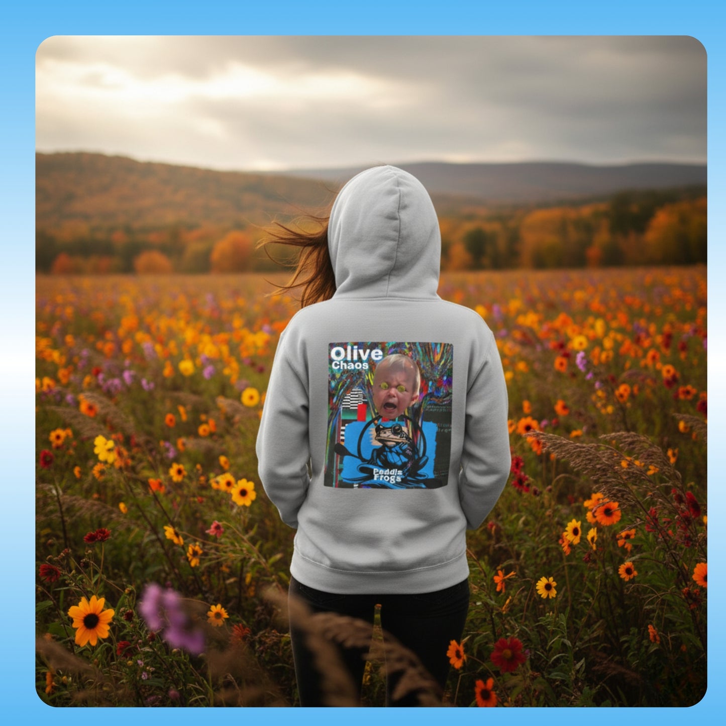 olive Chaos Cement Grey Paddle Frogs Outdoor Gear Hoodie pull over coat Person wearing a hoodie with a graphic design in a field of flowers