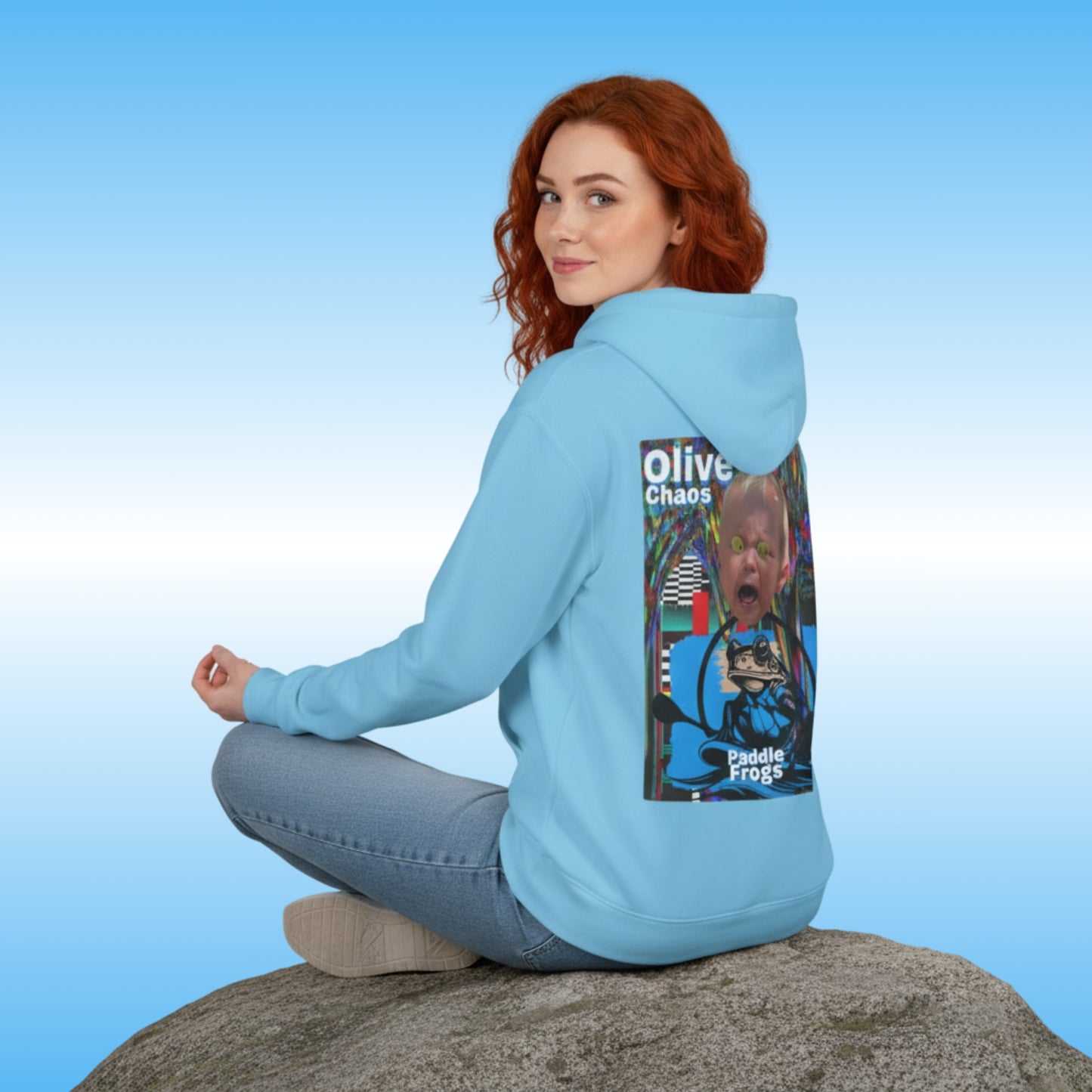 olive Chaos Sky Blue Paddle Frogs Outdoor Gear Hoodie pull over coat | Person wearing a light blue hoodie with a graphic design on the back against a blue background