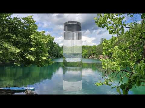 Paddle board resting at the Secret City blue water quarry. Clear see through water bottle music video