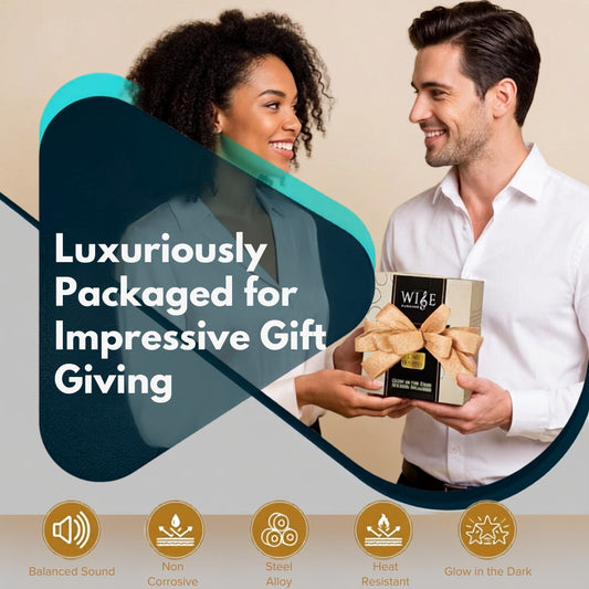 A man in a white shirt and a woman in a gray blazer are smiling while presenting a boxed gift. The gift box is wrapped in beige ribbon and labeled WISE steel tongue drum.