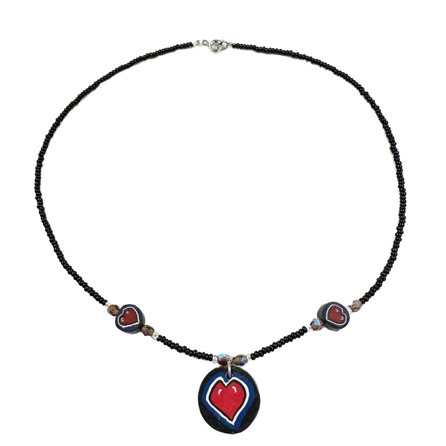 Necklace with heart-shaped pendants on a white background