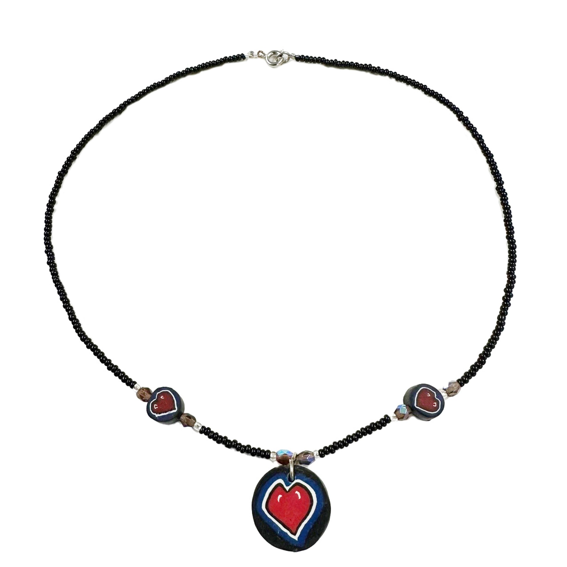 Necklace with heart-shaped pendants on a white background