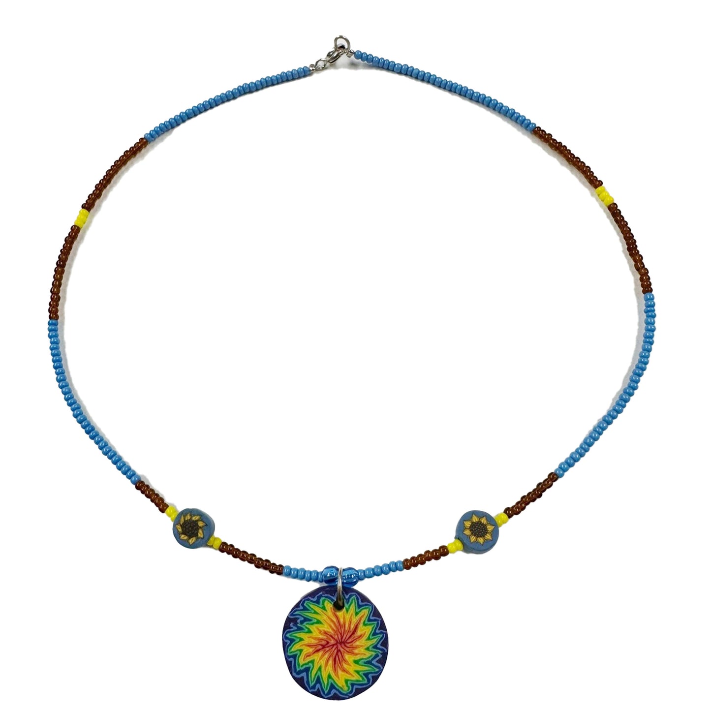 Necklace with a colorful circular pendant on a white background