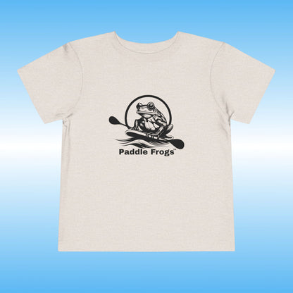 Beige t-shirt with 'Paddle Frogs' logo on a blue background