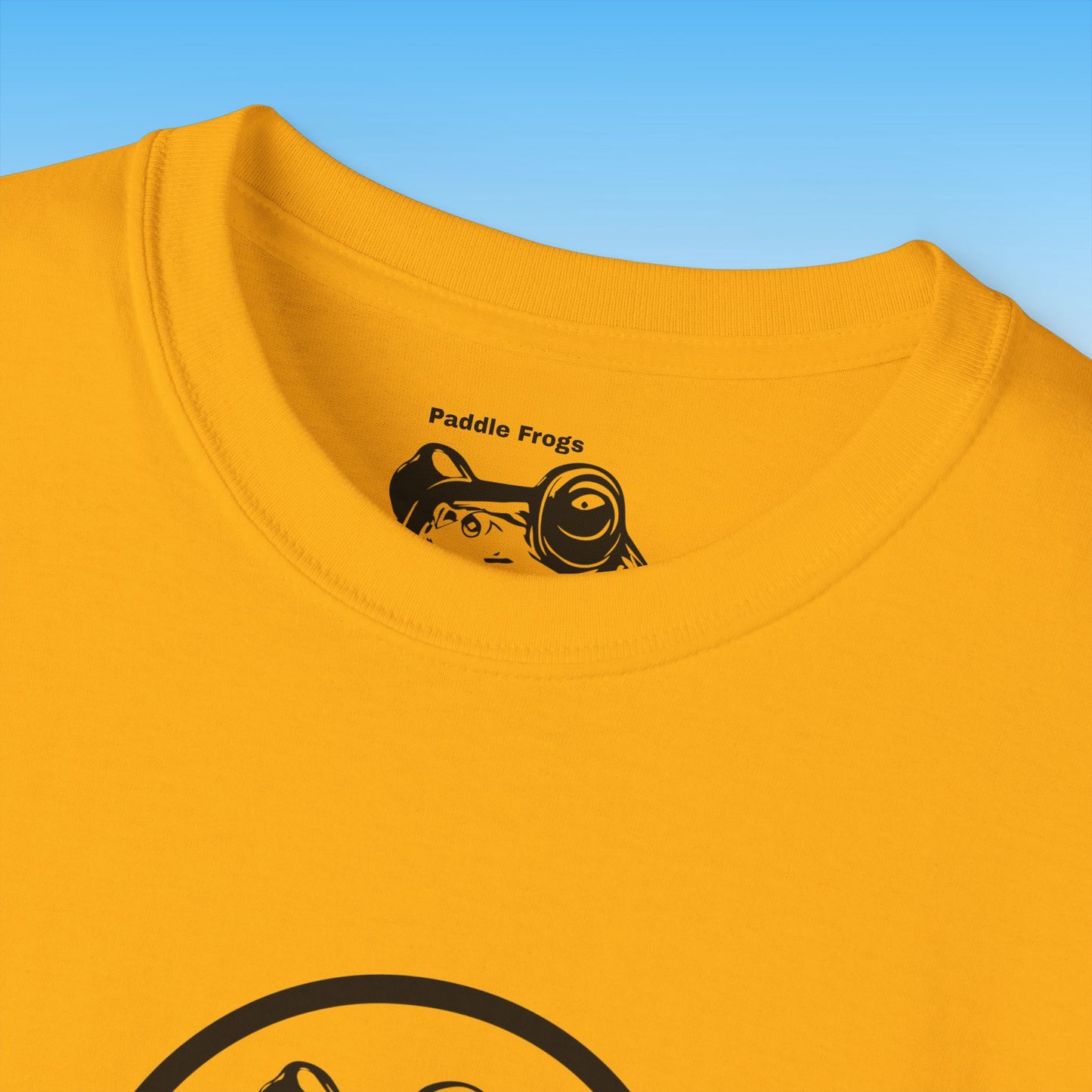 Yellow t-shirt with black graphic design on a blue background