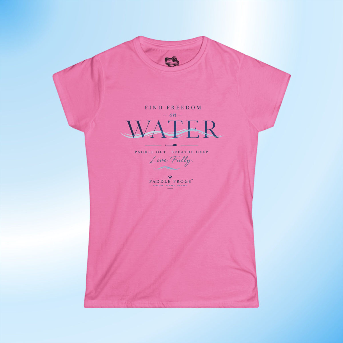 A pink short-sleeve crewneck t-shirt with a graphic print on the front reading 'FIND FREEDOM ON WATER' and 'Paddle Out. Breathe Deep.