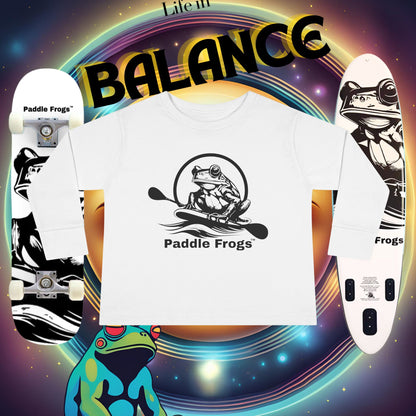 T-shirt with 'Paddle Frogs' logo and one skateboard and one paddle board on a colorful 'Life in Balance' background