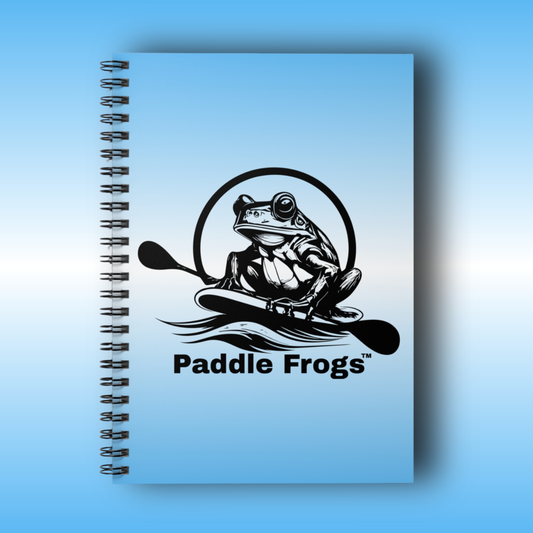 journal Notebook with a frog design and 'Paddle Frogs' text on a blue background