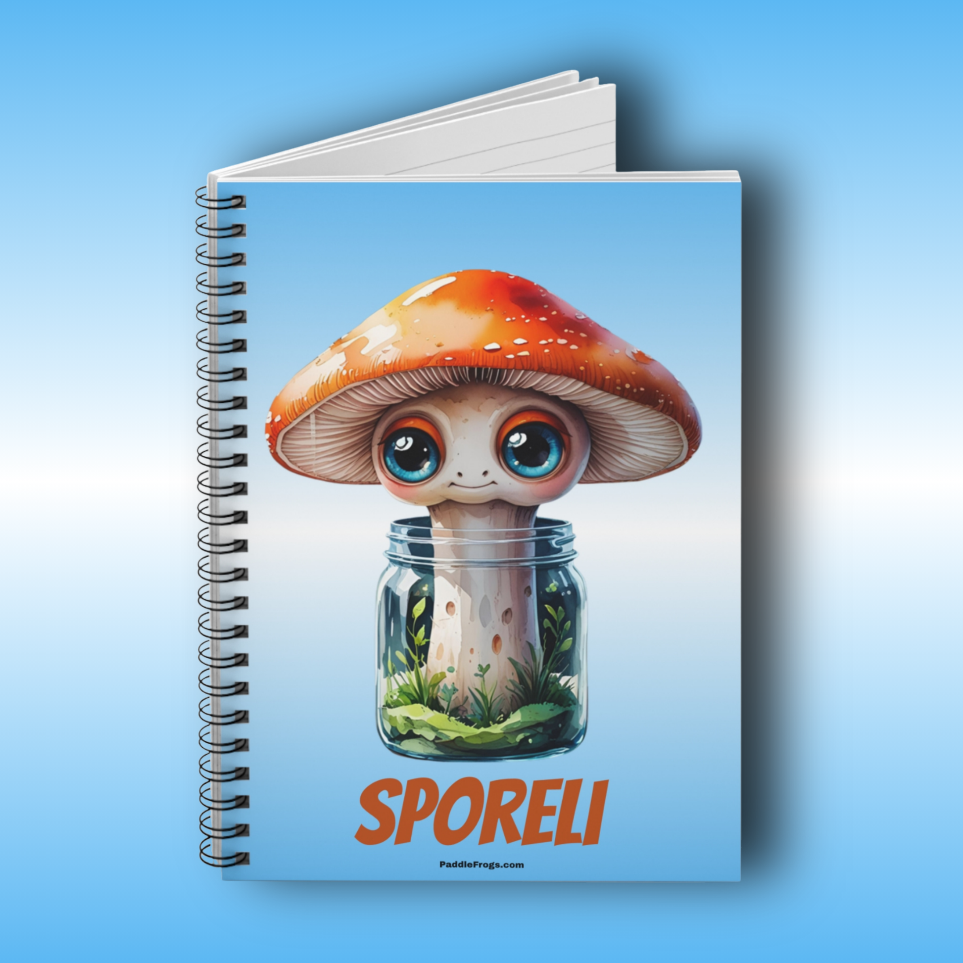 Paddle Frogs Sporeli Journal Notebook with a cartoon mushroom design on a blue background