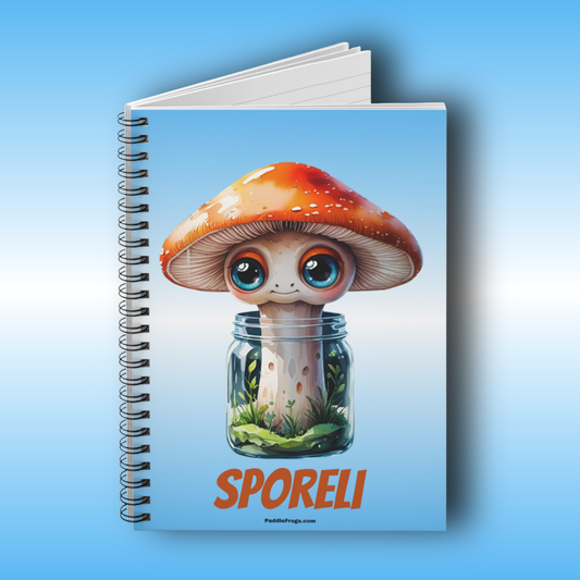 Paddle Frogs Sporeli Journal Notebook with a cartoon mushroom design on a blue background