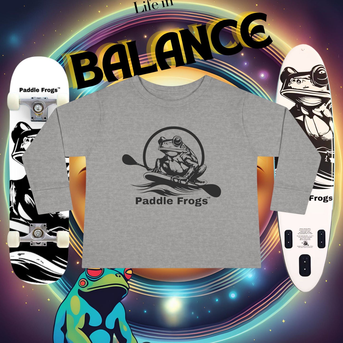 Gray t-shirt with 'Paddle Frogs' logo on a colorful background with a paddle board and a skateboard and frogs.