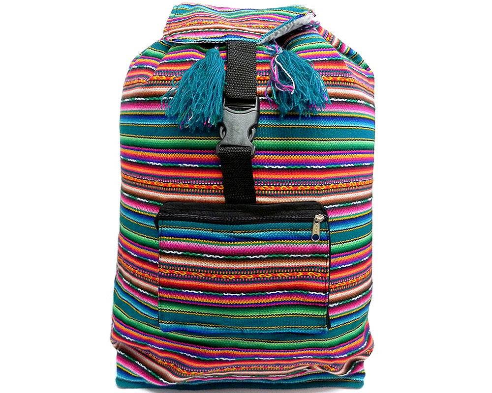Colorful striped backpack with tassels on a white background