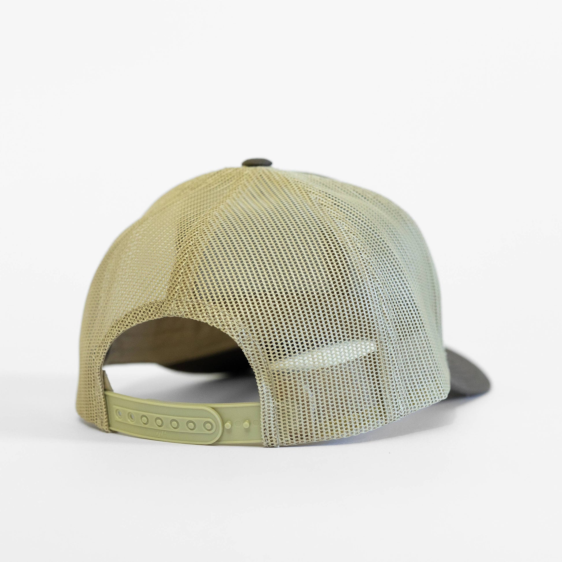 Beige mesh cap on a white background