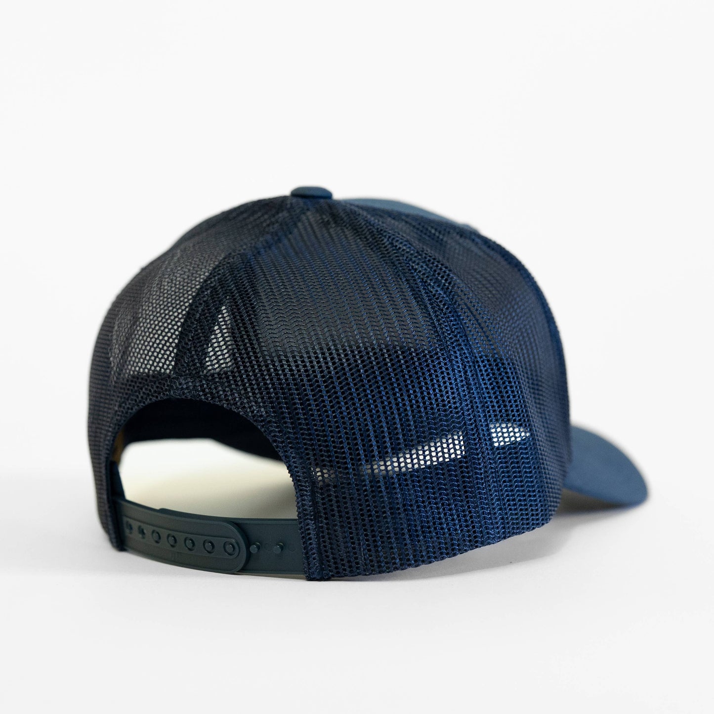 Navy blue mesh cap on a white background