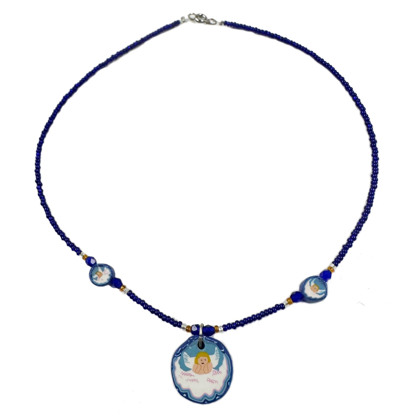 Necklace with blue beads and angel pendant on a white background