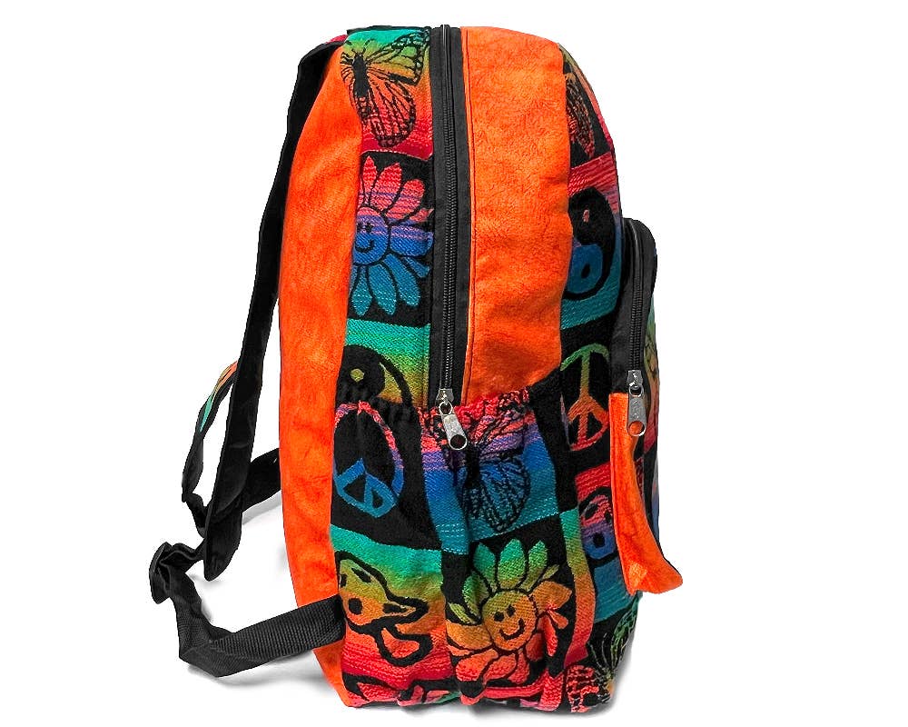 Colorful backpack with floral and peace symbol designs on a white background