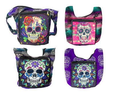 Four colorful shoulder bags with sugar skull designs on a white background