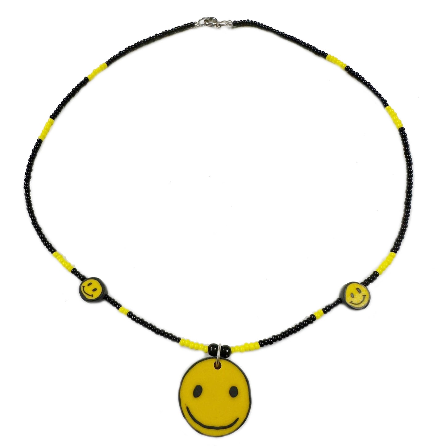 Necklace with smiley face pendants on a white background