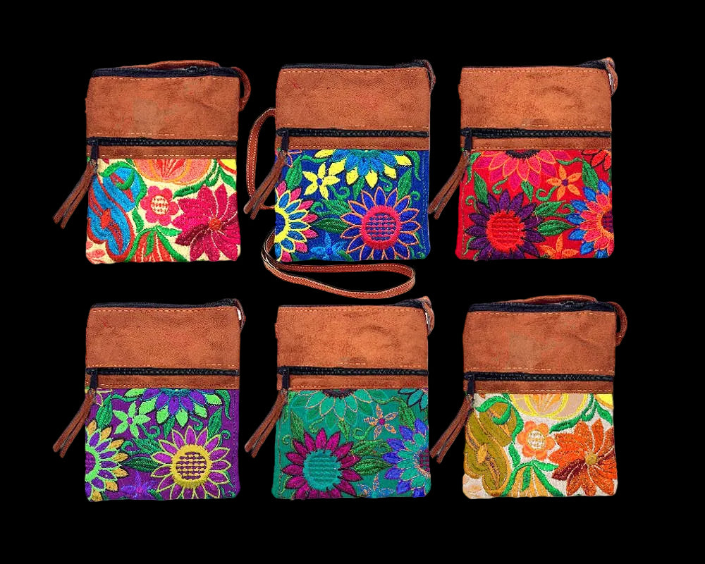 Set of six colorful handbags with floral patterns on a white background