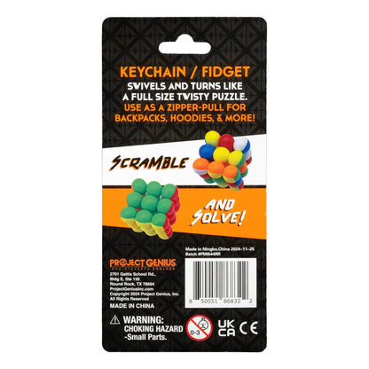 Scramble keychain fidget toy packaging with colorful balls on a black background