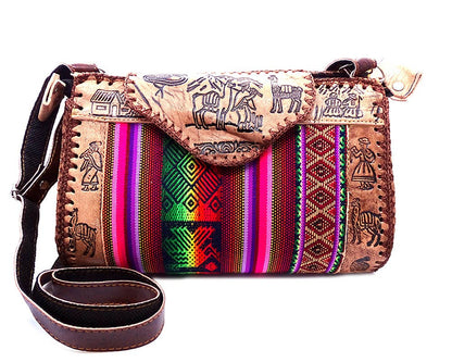 Colorful handbag with tribal patterns on a white background