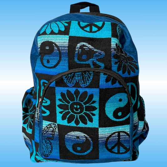 A 17 inch backpack with a blue and black checkered pattern, two bottle holders, featuring peace signs, yin-yang symbols, and flower motifs, set against a light blue gradient background.