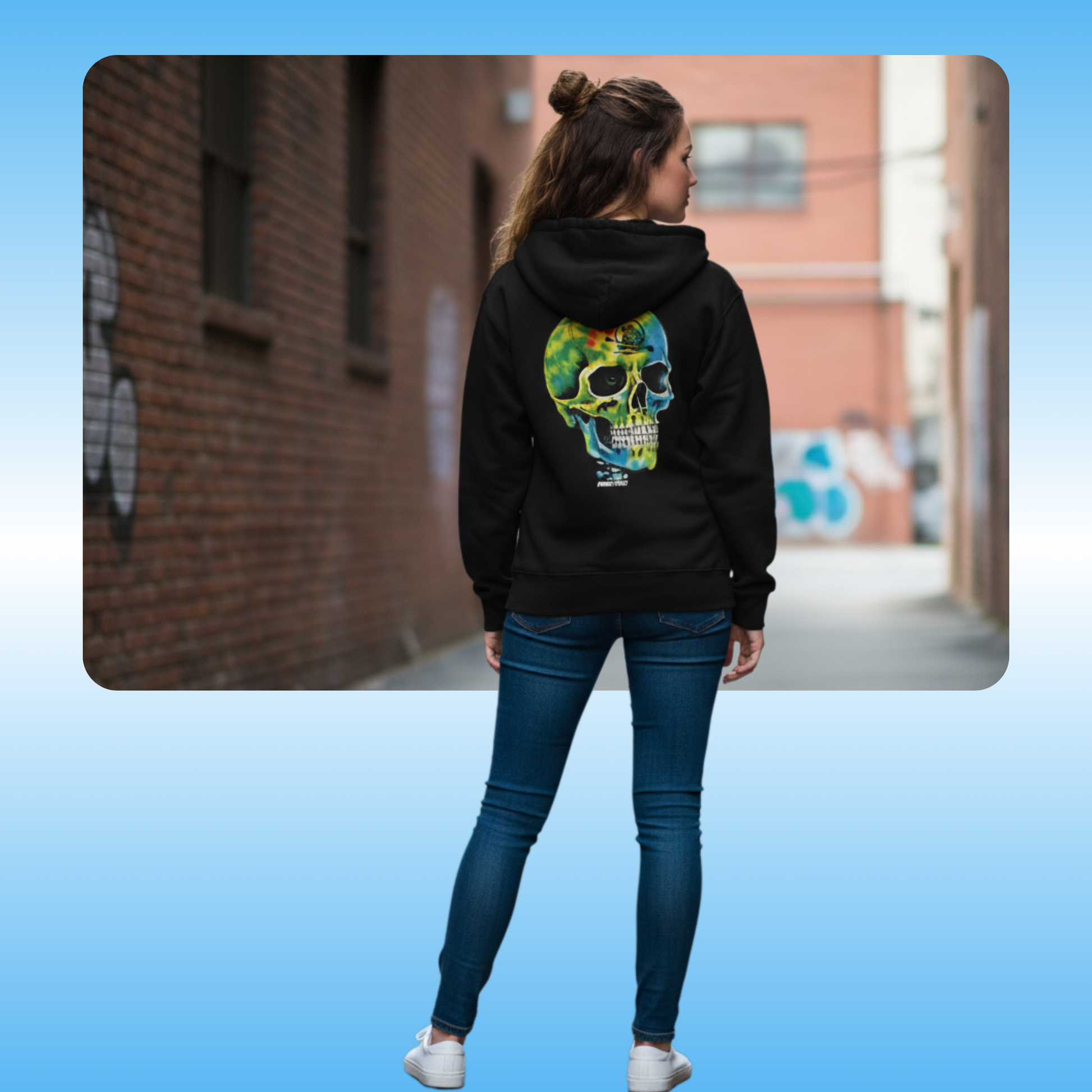 Balanced Bennie Hooded Jacket by Paddle Frogs Outdoor Gear | Tie Dye skeleton on black zip up hoodie Backside | Person wearing a black hoodie with a colorful skull design in an urban setting
