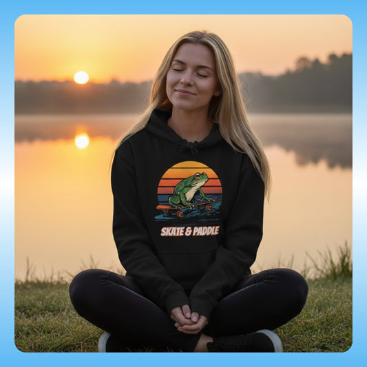 Blonde lady posing but not a poser relaxing by the lake at sunrise | Paddle Frogs™ Skate & Paddle Hoodie | Poetic Balance Black Retro