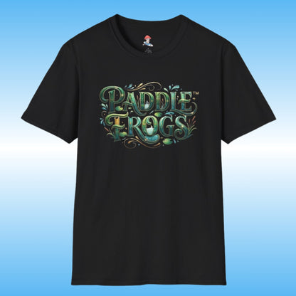 A black short-sleeve paddleboarding t-shirt featuring a stylized 'Paddle Frogs' graphic on the chest in green, teal, and gold tones, set against a light blue gradient background.