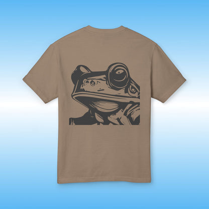 Brown t-shirt with a black frog graphic on a blue gradient background