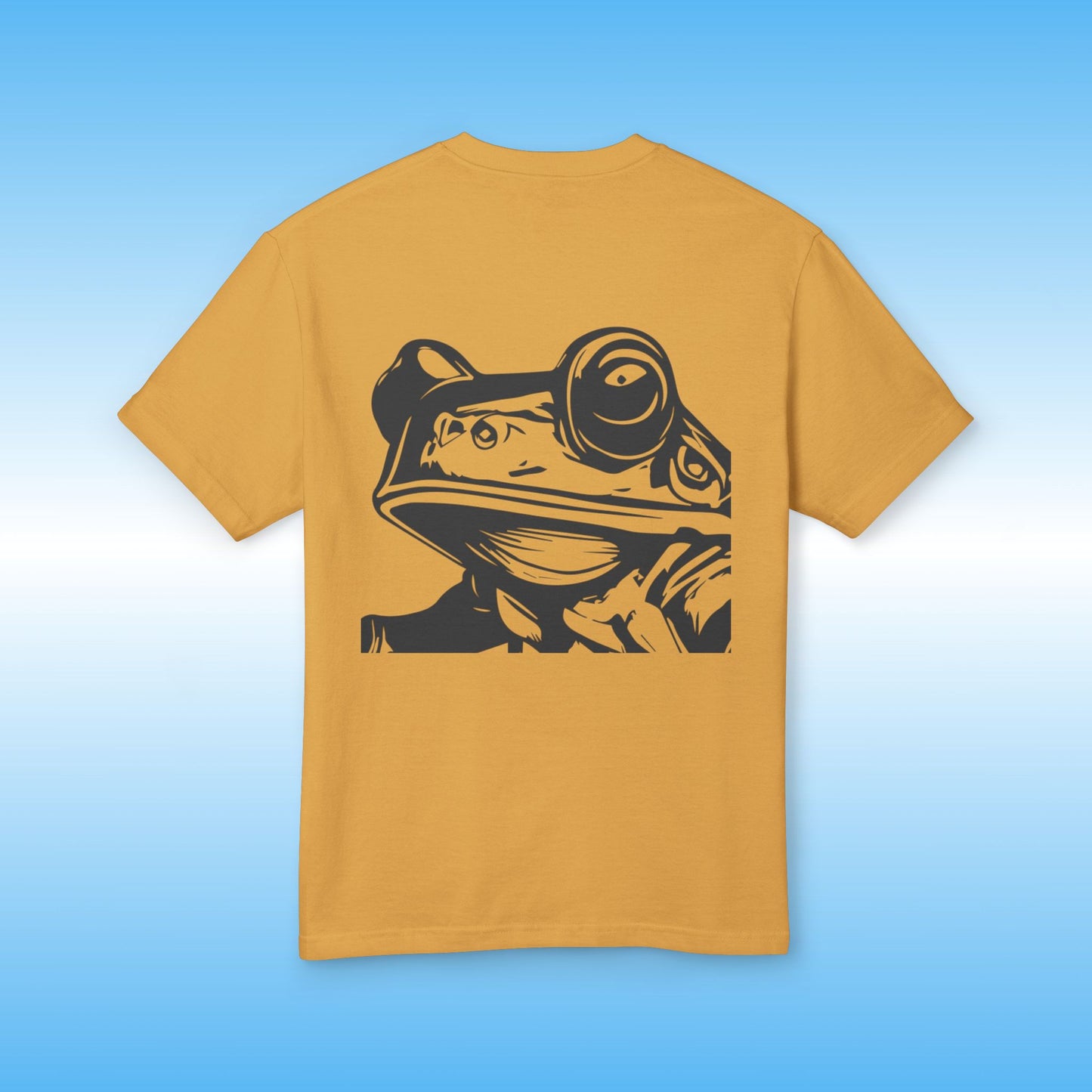 Earthy Tee's Dark faded mustard Yellow t-shirt with Paddle Frogs black frog face graphic on a blue gradient background
