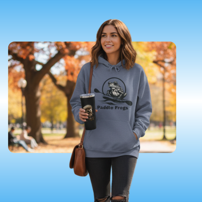 Edge Tumbler held by a Woman wearing a hoodie with a 'Paddle Frogs' logo in an autumn park setting